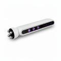Woman using LumiSculpt Pro face roller for lymphatic drainage and depuffing morning ritual
