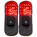 Pair of FootGlow Pro red light slippers with glowing red LEDs and digital controllers
